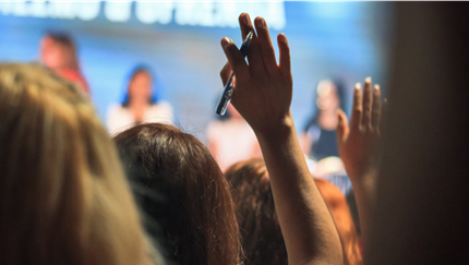Students raising their hands